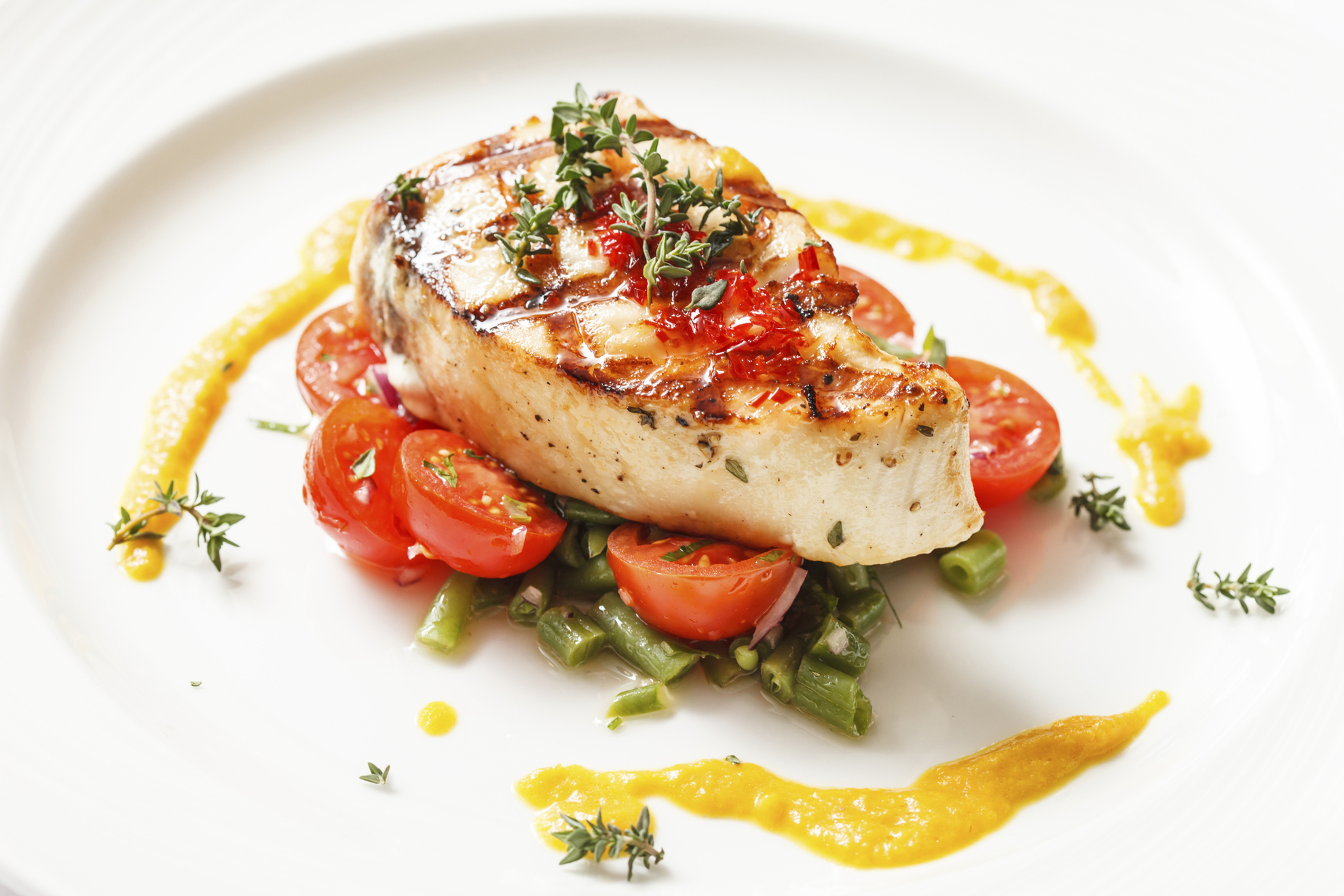 Wolfsbarschfilet auf Gemüse