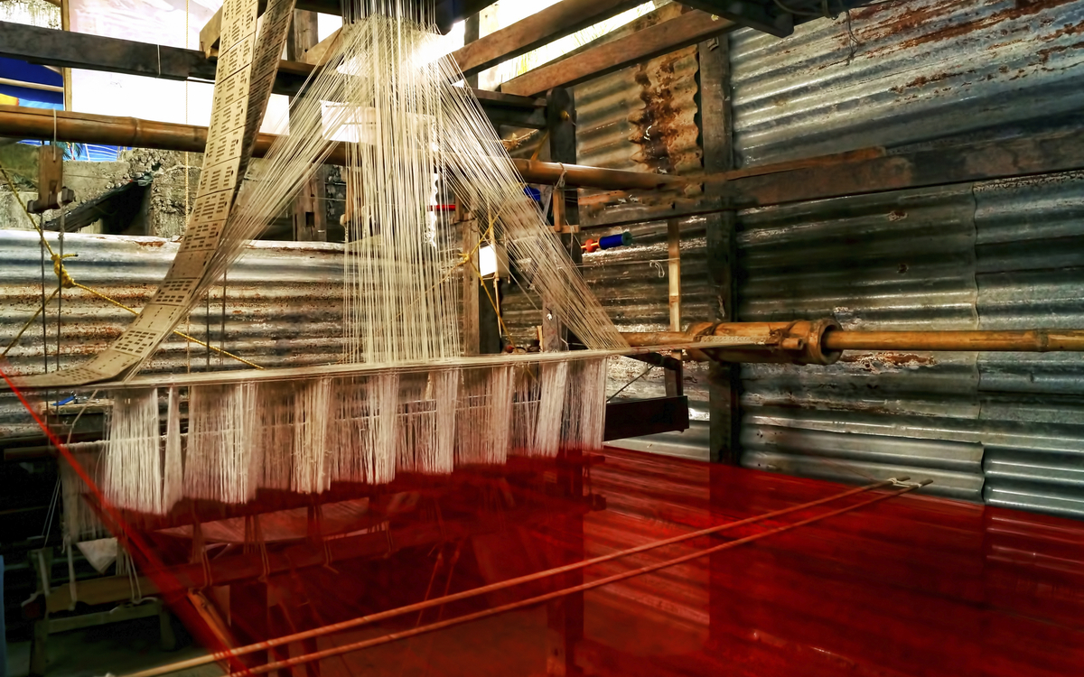 Weberei in Sualkuchi, Indien