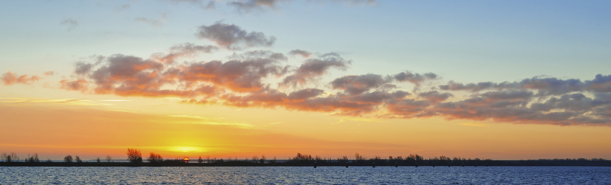 Sonnenuntergang über dem Ijsselmeer, Niederlande