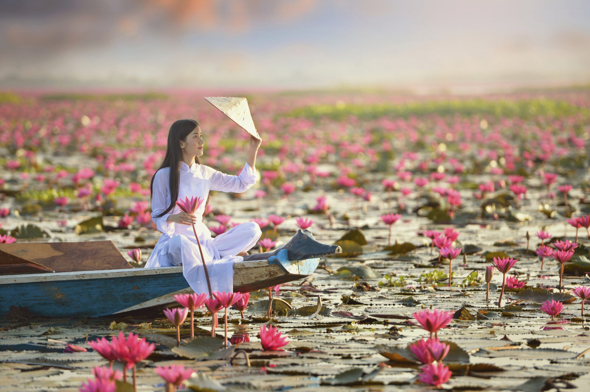 Frau auf dem Mekong